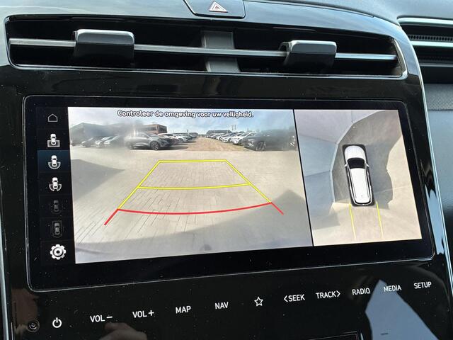 Hyundai TUCSON 1.6 T-GDI HEV 230 Premium Automaat / Dealer onderhouden / Afneembare Trekhaak (1.650KG) / Leder / Elektrische stoelen/klep / Stoelventilatie / Stuur-, stoel- & achterbankverwarming / Apple CarplayAndroid Auto / 19" LM wielen /