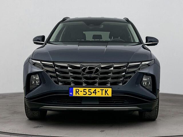 Hyundai TUCSON 1.6 T-GDI HEV Premium | All season banden | Parkeersensoren | Lederenbekleding | Metallic lak |