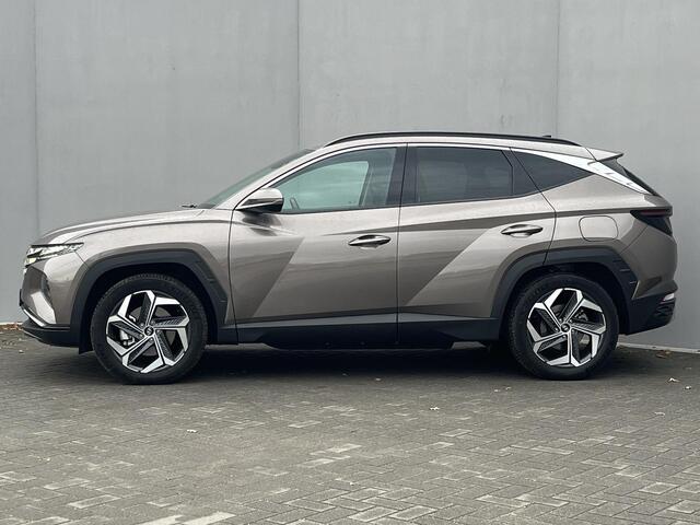 Hyundai TUCSON 1.6 T-GDI PHEV Comfort Smart 4WD / Vaste Trekhaak 13-polig (Trekgewicht 1.350kg) / Achteruitrijcamera / Stuur- en Stoelverwarming / Climate Control / Adaptieve Cruise Control / Apple Carplay & Android Auto / Keyless Entry & Start / Navigatie full map / E