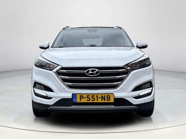 Hyundai TUCSON 1.6 T-GDi Premium 4WD | 1.600kg trekgewicht! | Trekhaak | Stoel en stuurverwarming | Dodehoekdetectie | achterbankverwarming | Elektrische achterklep |