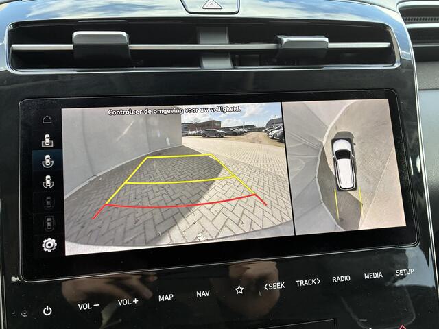 Hyundai TUCSON 1.6 T-GDI HEV Premium Sky / NL auto / Schuif/open dak / Stoel-/stuurverwarming / Navigatie / Achteruitrij-/360 Camera / Apple Carplay/Android auto / Elektrische achterklep / KRELL audio / Leren Bekleding /