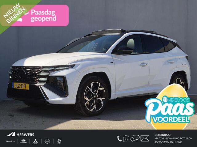 Hyundai TUCSON 1.6 T-GDI PHEV N Line Edition 4WD Automaat / Nieuw Model / Fabrieksgarantie tot 07-2029 / Dealer onderhouden / Trekgewicht 1210 kg / Glazen schuif- en kanteldak / Head Up Display / Stuur- & Stoelverwarming / Achteruitrijcamera / Elektrische achterklep / A