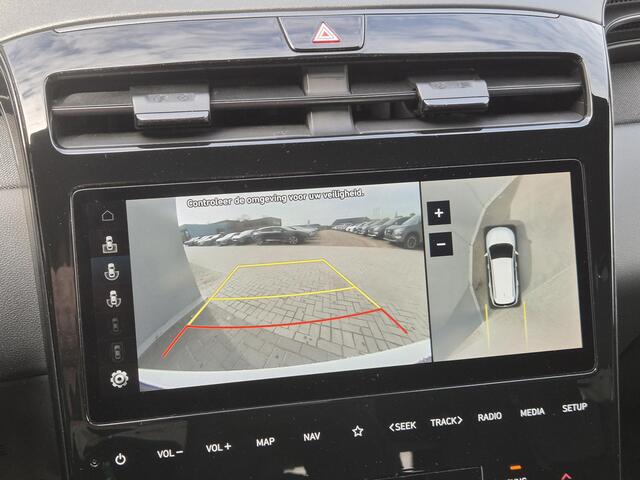 Hyundai TUCSON 1.6 T-GDI PHEV N Line Sky 4WD automaat / Dealer onderhouden / Fabrieksgarantie tot 02-2027 / Glazen schuif- en kanteldak / Trekgewicht 1350 kg / EAER bereik 62 km bereik stad 74 km / Elektrische achterklep / Stuur- Stoel & Achterbankverwarming / Stoelvent