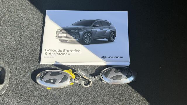 Hyundai TUCSON 1.6 T-GDI HEV N Line Edition Automaat / Afneembare Trekhaak / Facelift / Fabrieksgarantie tot 03-2030 / Camera / Dodehoek Detectie / Navigatie / Adaptieve Cruise / Stoel & Stuurwiel Verwarming / DAB / Keyless /