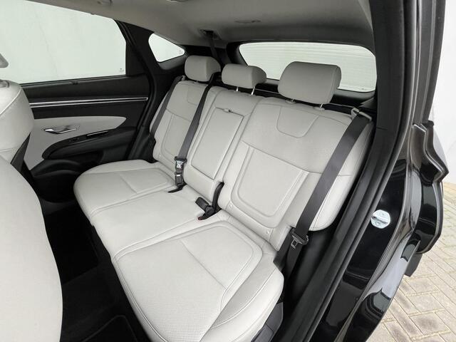 Hyundai TUCSON 1.6 T-GDI HEV Premium Sky / Schuif - kanteldak / Afn. trekhaak / Lederen interieur / Navigatie / Verwarmde + gekoelde stoelen + memory / 19 inch LMV.