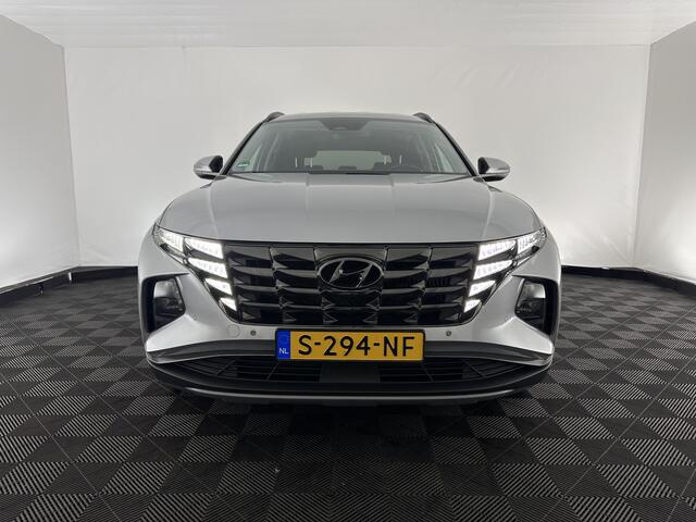 Hyundai TUCSON 1.6 T-GDI HEV Comfort Smart (INCL.BTW) *FULL-LED | ADAPTIVE-CRUISE | HEATED-COMFORTSEATS | KEYLESS | CAMERA | DIGI-COCKPIT | PRIVACY-GLASS | SHIFT-PADDLES | ECC | PDC | 17''ALU*