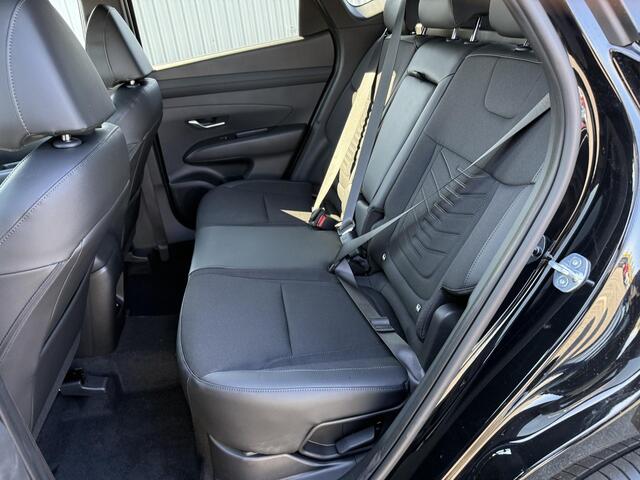 Hyundai TUCSON 1.6 T-GDI HEV Pure Edition / ¤500,- Voordeel / Direct Leverbaar / Stoel+Stuur Verwarming / Achteruitrij Camera / Navigatie / Keyless /