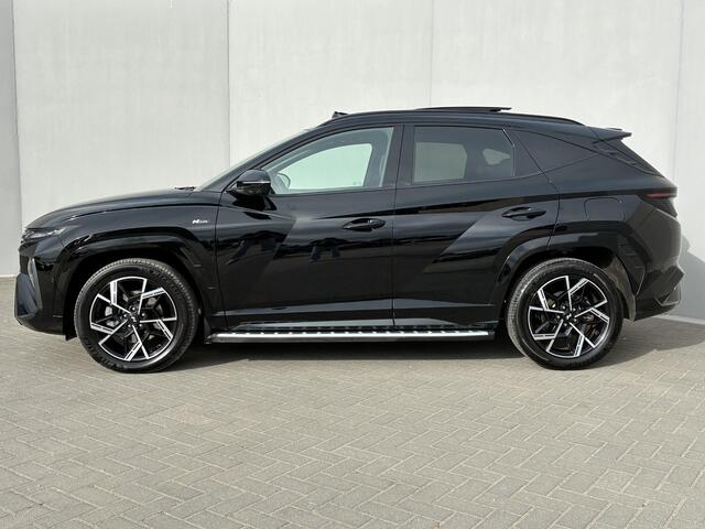 Hyundai TUCSON 1.6 T-GDI HEV N Line Sky / Fabrieksgarantie t/m 8-2029 / dealer onderhouden / 1.360 kg trekgewicht / Panorama/schuif-/kanteldak / Elektrische stoelen/Achterklep / Apple Carplay/Android Auto / Stoelventilatie / Stuur-, stoelverwarming / 19" LM /