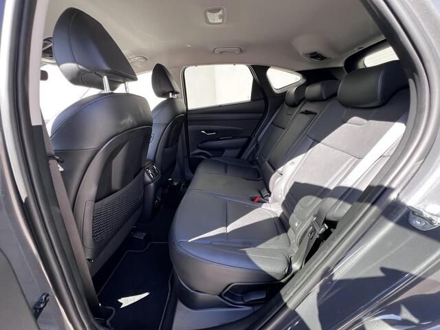 Hyundai TUCSON 1.6 T-GDI HEV Comfort Smart / Nieuw model / Fabrieksgarantie tot 7-2029 / Dealer onderhouden / Navigatie / Stuur- en stoelverwarming / Elektrische klep / Adaptieve CC / 19"LM wielen /