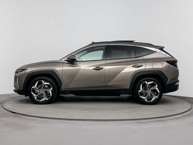 Hyundai TUCSON 1.6 T-GDI PHEV Premium Sky 4WD | Schuif kanteldak | Trekhaak 1350kg | Dodehoek detectie | Stoel verwarming & verkoeling | Navigatie |