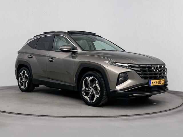 Hyundai TUCSON 1.6 T-GDI PHEV Premium Sky 4WD | Schuif kanteldak | Trekhaak 1350kg | Dodehoek detectie | Stoel verwarming & verkoeling | Navigatie |
