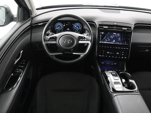 Hyundai TUCSON 1.6 T-GDI HEV Comfort | Trekhaak | Stoelverwarming | Adaptive cruise | Carplay | Camera | Navigatie | Keyless | Full LED | 17'' | Parkeerhulp | Climate control | Digital Cockpit