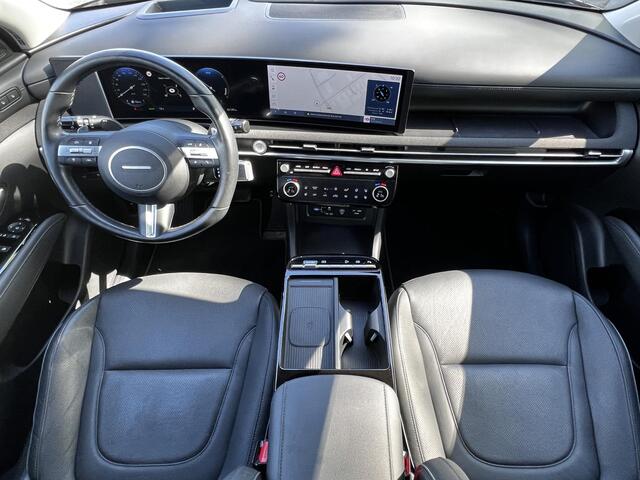 Hyundai TUCSON 1.6 T-GDI HEV 215pk Premium / Nieuw model / Fabrieksgarantie tot 7-2029 / Dealer onderhouden / Navigatie / Stuur- en stoelverwarming / Elektrische klep / Adaptieve CC / 19"LM wielen /