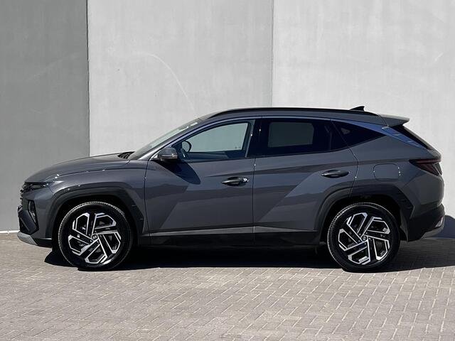 Hyundai TUCSON 1.6 T-GDI HEV 215pk Premium / Nieuw model / Fabrieksgarantie tot 7-2029 / Dealer onderhouden / Navigatie / Stuur- en stoelverwarming / Elektrische klep / Adaptieve CC / 19"LM wielen /