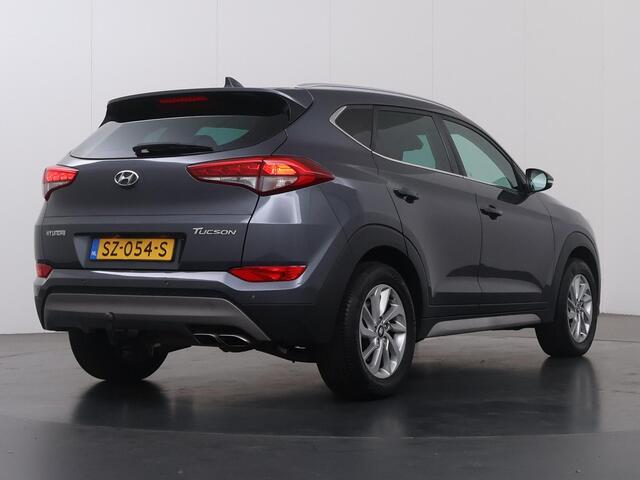 Hyundai TUCSON 1.6 T-GDi Comfort | 1900kg Trekkracht | Navigatie | Climate Control | Stoelverwarming voor + achter | Camera | Trekhaak | DAB |
