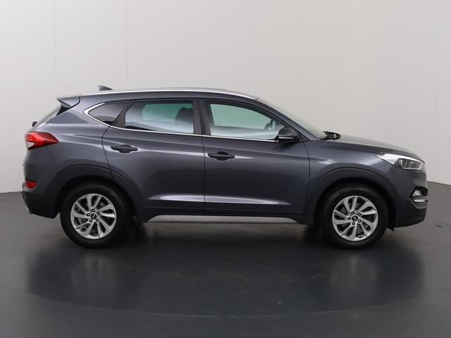 Hyundai TUCSON 1.6 T-GDi Comfort | 1900kg Trekkracht | Navigatie | Climate Control | Stoelverwarming voor + achter | Camera | Trekhaak | DAB |