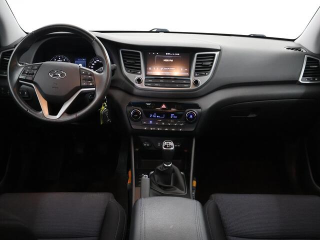 Hyundai TUCSON 1.6 T-GDi Comfort | 1900kg Trekkracht | Navigatie | Climate Control | Stoelverwarming voor + achter | Camera | Trekhaak | DAB |