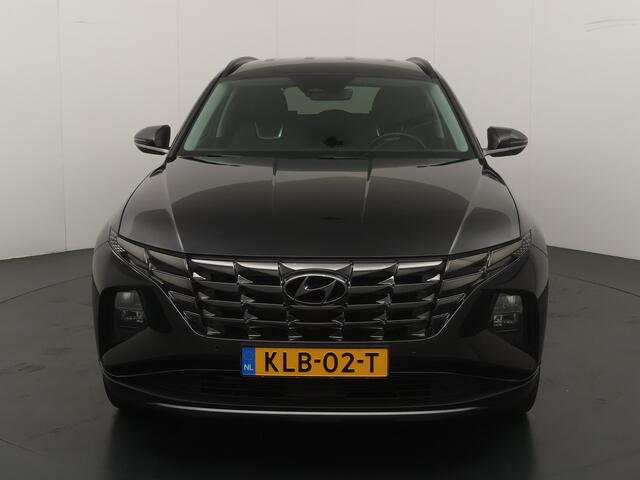 Hyundai TUCSON 1.6 T-GDI PHEV 265pk Comfort 4WD | Trekhaak | Stoelverwarming | Adapt. cruise | Elektrisch verstelbare stoel | Camera | Krell audio |