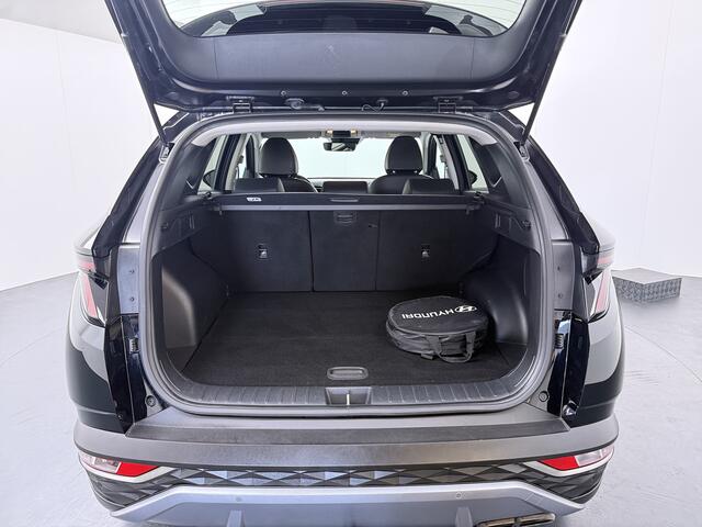 Hyundai TUCSON 1.6 T-GDI PHEV 265pk Comfort 4WD | Trekhaak | Stoelverwarming | Adapt. cruise | Elektrisch verstelbare stoel | Camera | Krell audio |