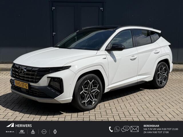 Hyundai TUCSON 1.6 T-GDI PHEV N Line Sky 4WD / Dealer onderhouden / Fabrieksgarantie tot 03-2027 / Trekgewicht 1350 kg / Glazen schuif- en kanteldak / Elektrische achterklep / Stuur- Stoel & Achterbank verwarming / Adaptief cruise control / Rondomzicht camera / Stoelven