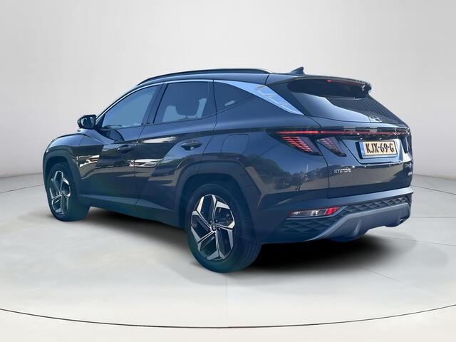 Hyundai TUCSON 1.6 T-GDI PHEV Premium Sky 4WD | Panoramisch schuif/kantel dak | Apple Carplay/Android Auto | Stoelverwarming/verkoeling | Elektrische achterklep | Elektrische verstelbare stoelen met geheugen |