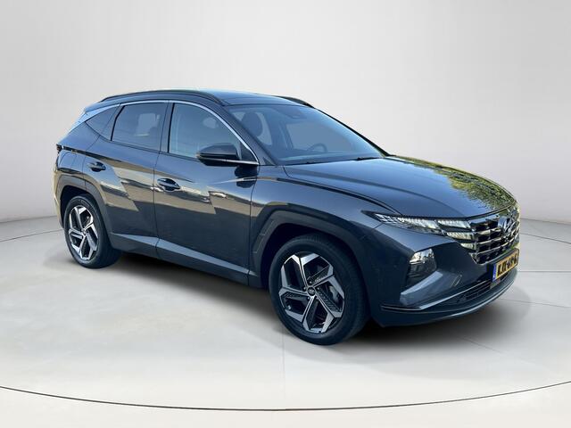 Hyundai TUCSON 1.6 T-GDI PHEV Premium Sky 4WD | Panoramisch schuif/kantel dak | Apple Carplay/Android Auto | Stoelverwarming/verkoeling | Elektrische achterklep | Elektrische verstelbare stoelen met geheugen |