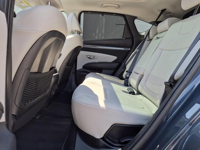 Hyundai TUCSON 1.6 T-GDI PHEV Premium Sky 4WD / Glazen schuif- en kanteldak / Rondomzicht camera / Trekgewicht 1.350 kg / Elektrische achterklep / Stuur- Stoel & Achterbank verwarming / Adaptief cruise control / Stoelventilatie / Apple Carplay Android Auto /