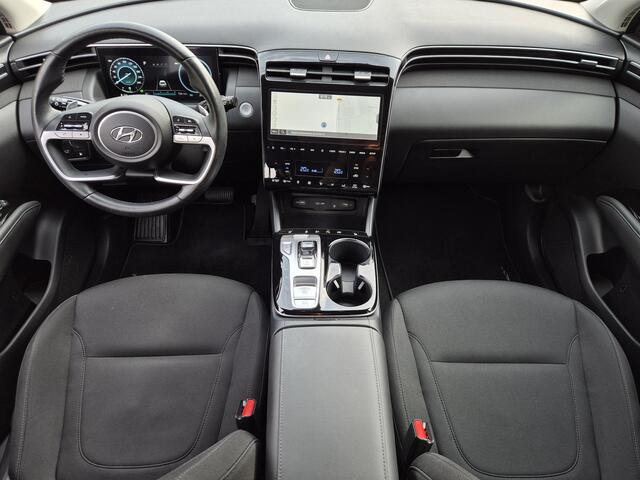 Hyundai TUCSON 1.6 T-GDI PHEV Comfort Smart 4WD / SOH 97% / Dealer onderhouden / Fabrieksgarantie tot 06-2027 / 1.350 kg trekgewicht / Elektrische achterklep / Achteruitrijcamera / Stuur- & Stoelverwarming / Apple Carplay Android Auto / Adaptief cruise control /