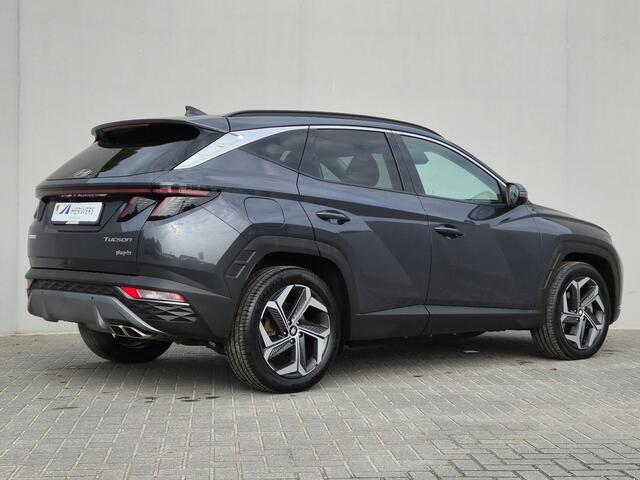 Hyundai TUCSON 1.6 T-GDI PHEV Comfort Smart 4WD / SOH 97% / Dealer onderhouden / Fabrieksgarantie tot 06-2027 / 1.350 kg trekgewicht / Elektrische achterklep / Achteruitrijcamera / Stuur- & Stoelverwarming / Apple Carplay Android Auto / Adaptief cruise control /