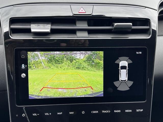 Hyundai TUCSON 1.6 T-GDI PHEV Comfort Smart 4WD / Fabrieksgarantie tot 02-2027 / Afn. trekhaak 1.350 kg / Navigatie / Apple Carplay Android / Camera / Stuur- & stoelverwarming /19" LM wielen /