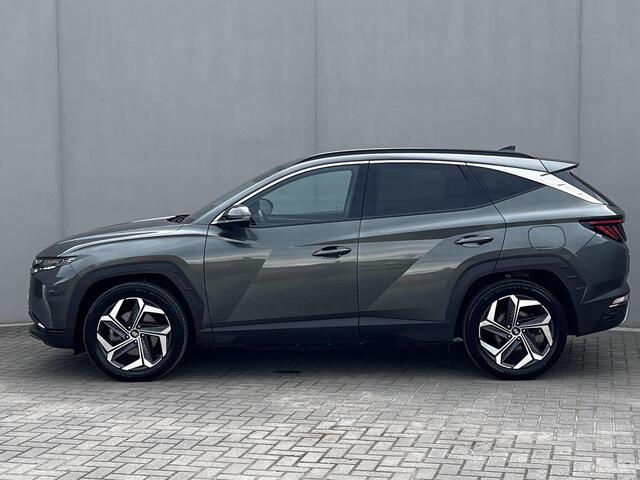 Hyundai TUCSON 1.6 T-GDI PHEV Comfort Smart 4WD / Fabrieksgarantie tot 02-2027 / Afn. trekhaak 1.350 kg / Navigatie / Apple Carplay Android / Camera / Stuur- & stoelverwarming /19" LM wielen /