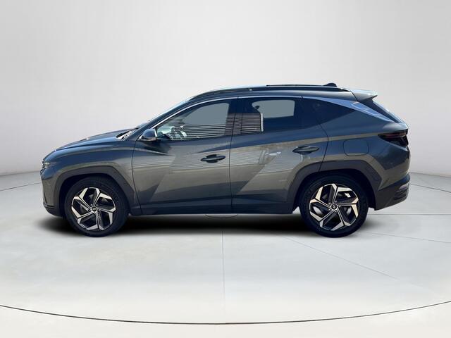 Hyundai TUCSON 1.6 T-GDI PHEV Premium Sky 4WD | Panoramisch schuif/kantel dak | Apple Carplay/Android Auto | Stoelverwarming/verkoeling | Elektrische achterklep | Elektrische verstelbare stoelen met geheugen |
