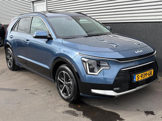 KIA Niro 1.6 GDi Hybrid DynamicPlusLine Schuif-/kanteldak, Trekhaak, Dodehoek detectie, Nieuw geleverd, Parkeersensoren v&a, Stoel- & stuurwiel verwarming, Navigatie, Apple CarPlay/Android Auto, Achteruitrij camera