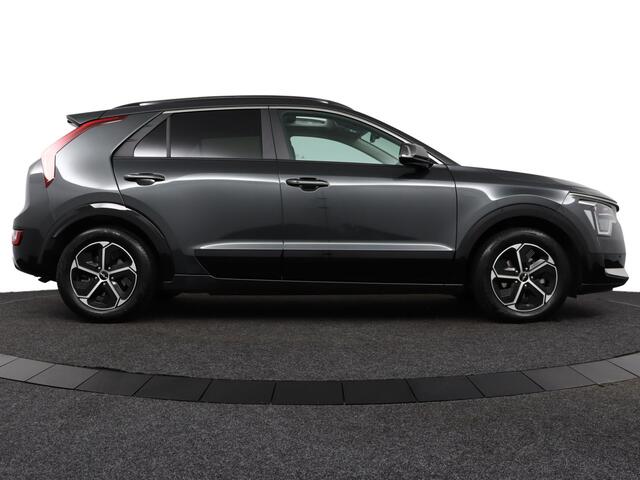 KIA Niro 1.6 GDi Hybrid DynamicPlusLine - Stoel/-Stuuverwarming - Schuif-/Kanteldak - Elektrische Achterklep - Apple Carplay/Android Auto - Achteruitrijcamera - Parkeersensoren Voor en Achter