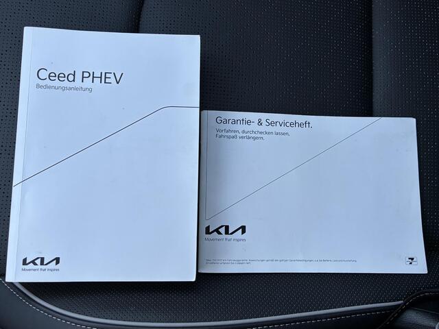 KIA Xceed 1.6 GDi PHEV ExecutiveLine / Volledig Onderhouden / Stuur-/Stoelverwarming / Apple Carplay/Android Auto / Schuif-/Kanteldak / Navigatie / Achteruitrijcamera / Adaptieve Cruise Control / Elektrische achterklep /