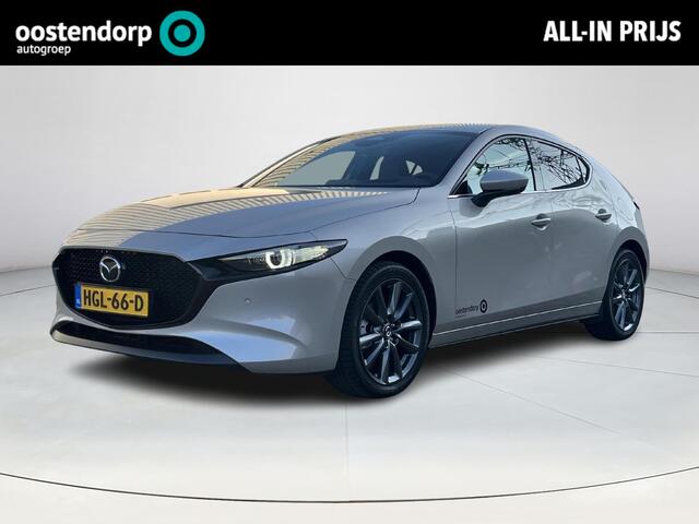 Mazda 3 2.5 e-SkyActiv-G M Hybrid 140 Takumi | Automaat | Demo | Stoel/stuurverwarming | 360 graden camera | Apple Carplay/Android Auto | Privacy glass | Leder | Elektrische verstelbare stoelen met geheugen |