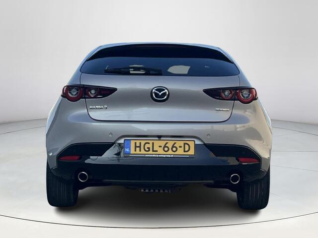 Mazda 3 2.5 e-SkyActiv-G M Hybrid 140 Takumi | Automaat | Demo | Stoel/stuurverwarming | 360 graden camera | Apple Carplay/Android Auto | Privacy glass | Leder | Elektrische verstelbare stoelen met geheugen |
