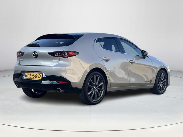 Mazda 3 2.5 e-SkyActiv-G M Hybrid 140 Takumi | Automaat | Demo | Stoel/stuurverwarming | 360 graden camera | Apple Carplay/Android Auto | Privacy glass | Leder | Elektrische verstelbare stoelen met geheugen |