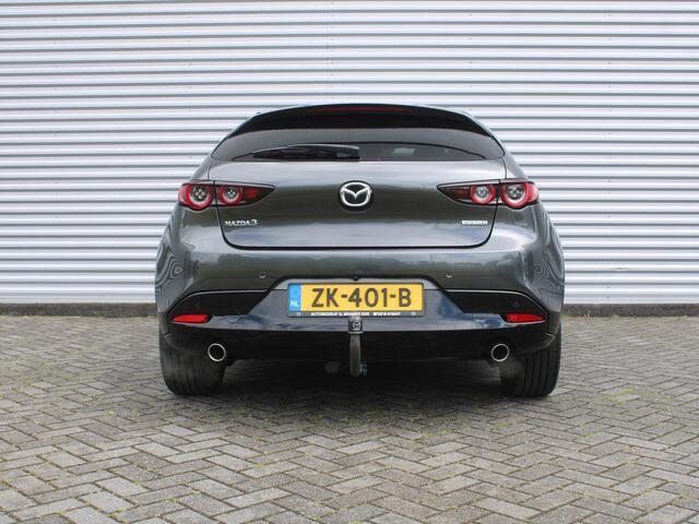 Mazda 3 2.0 e-SkyActiv-G M Hybrid 122 Luxury | Trekhaak | Stuur-/stoelverwarming | Leer | 360 Camera | Stoelgeheugen | 18" LM | HUD | LED | Cruise adapt. |