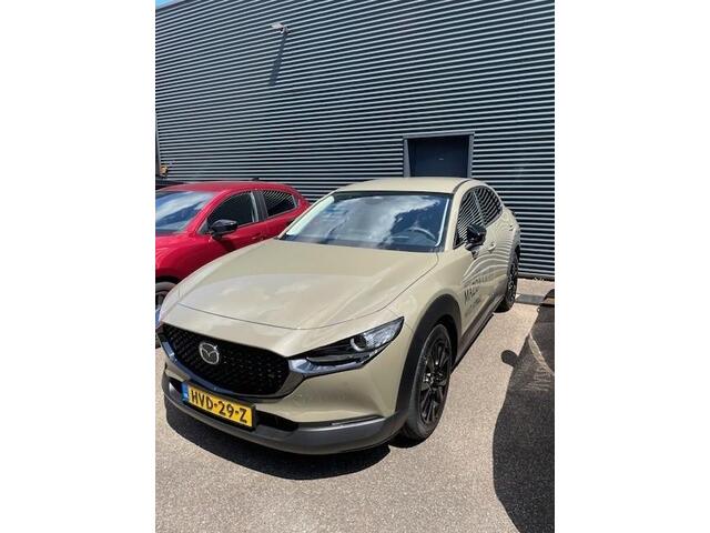 Mazda CX-30 2.0 e-SkyActiv-X M Hybrid Nagisa Demovoordeel ¤ 5.000,-, Automaat, Bruin Leder, Bose, Navi, Adap.Cruise, Clima, Apple Carplay, Camera, PDC, HUD, Stoelverwarming, 18" LMV
