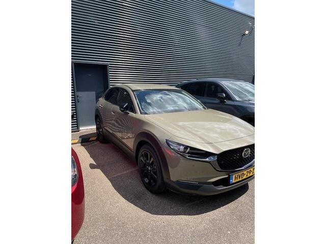 Mazda CX-30 2.0 e-SkyActiv-X M Hybrid Nagisa Demovoordeel ¤ 5.000,-, Automaat, Bruin Leder, Bose, Navi, Adap.Cruise, Clima, Apple Carplay, Camera, PDC, HUD, Stoelverwarming, 18" LMV