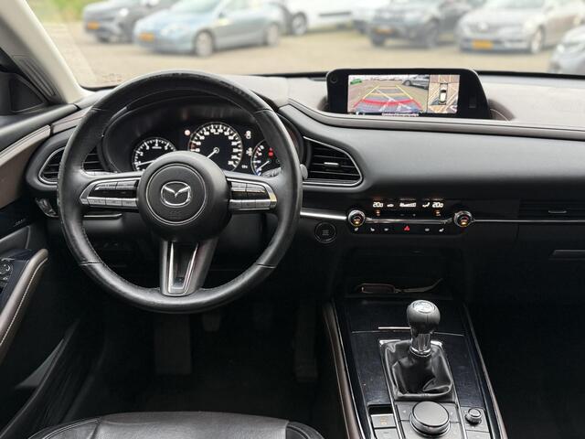 Mazda CX-30 2.0 e-SkyActiv-X M Hybrid Luxury | NAP | elektrisch glazen schuif-/kanteldak | Leer | Stoel & stuur verwarming | 360 graden camera | Bose Audio | Memory Stoelen |