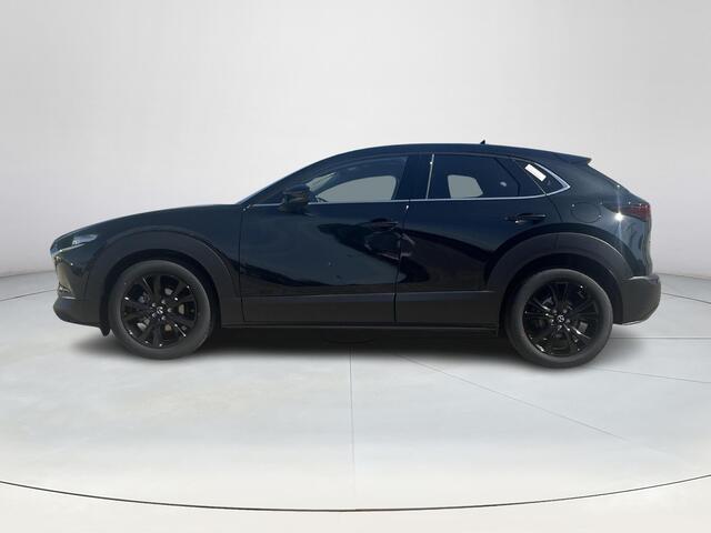 Mazda CX-30 2.5 e-SkyActiv-G M Hybrid Homura | Dodehoeksensoren | Draadloze Applecarplay en Android Auto | Adaptieve Cruise Control | Automaat | 18inch zwarte velgen | Achteruitrijcamera | Elektrische achterklep |