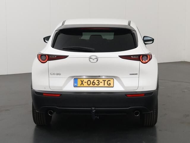 Mazda CX-30 2.0 e-SkyActiv-G M Hybrid Sportive | Trekhaak | Dodehoekdetectie | HUD | Apple Carplay/Android Auto | Elektrisch bedienbare achterklep | Stoelverwarming | Lane Assist |