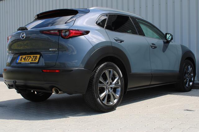 Mazda CX-30 2.0 e-SkyActiv-X M Hybrid Luxury | Adaptieve cruise control | Apple carplay/Android auto | Stoel/stuurverwarming | Trekhaak | Head-up display | Parkeercamera | Memory seat | Bose audio |