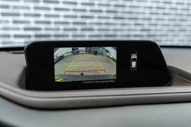 Mazda CX-30 2.0 e-SkyActiv-X M Hybrid Luxury | Trekhaak | Schuifdak | Lederen Bekleding | Bose Audio | Head-up Display | Lichtmetalen Velgen | Elektrische Achterklep | Keyless Entry | Navigatie | Apple Carplay Android Auto | Achteruitrijcamera | Parkeersensoren
