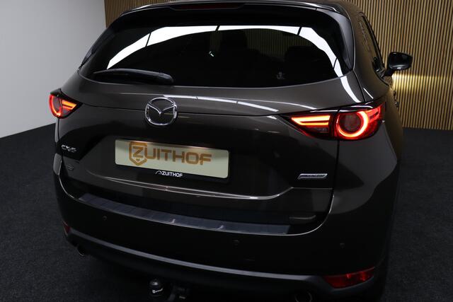 Mazda CX-5 2.0 SkyActiv-G 165 Business Luxury | Adaptive-cruise | Afneembare Trekhaak | 360 Graden Camera | Elek. Achterklep | Apple Carplay | Head-up Display | Keyless | Leder | Dodehoekdetectie