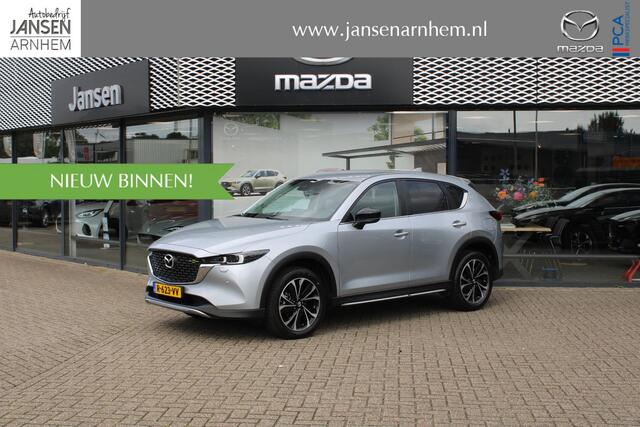Mazda CX-5 2.0 SkyActiv-G 165 Newground Automaat, Trekhaak, All Season, LMV 19 Inch, Navi, Clima, Stoelverwarming, Stuurverwarming, Half Leder, Apple Carplay, HUD, Cruise, LKA, Elektrische klep