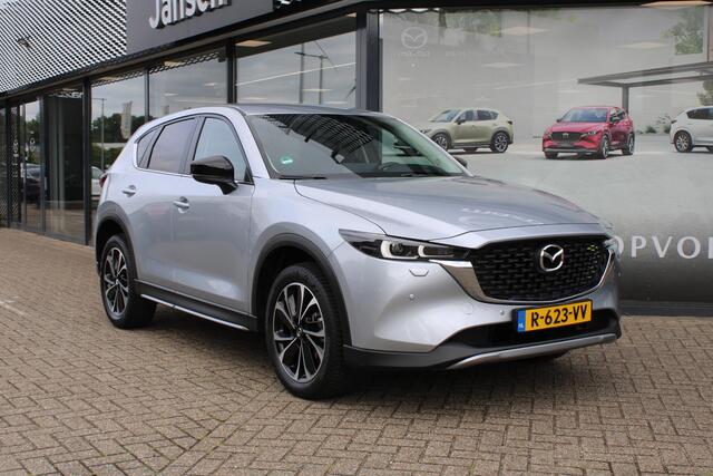 Mazda CX-5 2.0 SkyActiv-G 165 Newground Automaat, Trekhaak, All Season, LMV 19 Inch, Navi, Clima, Stoelverwarming, Stuurverwarming, Half Leder, Apple Carplay, HUD, Cruise, LKA, Elektrische klep