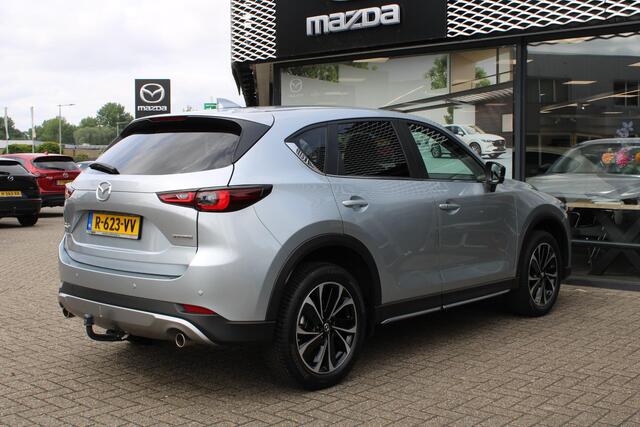 Mazda CX-5 2.0 SkyActiv-G 165 Newground Automaat, Trekhaak, All Season, LMV 19 Inch, Navi, Clima, Stoelverwarming, Stuurverwarming, Half Leder, Apple Carplay, HUD, Cruise, LKA, Elektrische klep